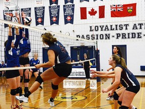 Brianna Jensen of St. Theresa makes a play at the net during OFSAA AA girls volleyball action Monday at Loyalist College. (Cliff Malone photo)