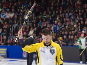 Manitoba skip Mike McEwen acknowledges the crowd after defeating Alberta 10-6 in draw 7 action at the Tim Hortons Brier curling championship at Mile One Centre in St. John's on Monday, March 6, 2017.  Tuesday morning McEwen improved to 5-0 and is the only unbeaten team.