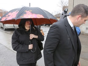 Ontario teacher Jaclyn McLaren (left) arrives with her lawyer Pieter Kort at the Quinte Courthouse in Belleville on Tuesday March 7, 2017. McLaren is facing dozens of charges related to sex crimes against minors. (THE CANADIAN PRESS/Lars Hagberg)