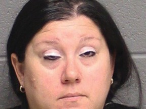 This undated booking photograph provided by the Monroe, Conn., Police Department shows Lisa Nussbaum, arrested and charged Friday, March 3, 2017, for letting her 10-year-old son drive her car on public roads and streaming it on Facebook Live. (Monroe Police Department via AP)
