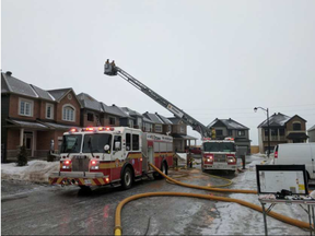 Firefighters on the scene of a fire on Yellow Birch Street near Orléans.