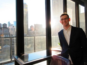 This March 2, 2017 photo shows Lonely Planet CEO Daniel Houghton at a rooftop bar in in New York. Houghton was just 24 when he became head of Lonely Planet in 2013. Since then he's restructured the company, expanded its digital presence and to the surprise of many who feared he'd kill off Lonely Planet guidebooks, he's grown the print side of the business. (AP Photo/Beth J. Harpaz)