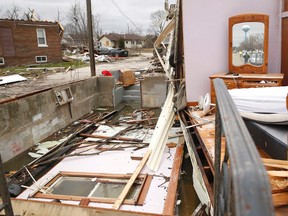 Tornados impacted north central Illinois towns Naplate and Ottawa Tuesday night. Residents clean up in Ottawa on Wednesday, Mar. 1, 2017. (Daniel White/Daily Herald via AP)
