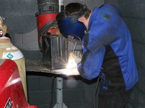 BRUCE BELL/THE INTELLIGENCER
Robert Bentley of Centennial Secondary School works on his welding project at the Loyalist College Skills Competition on Tuesday.