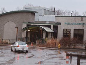 A police car is parked in front of the Louis S. Wolk Jewish Community Center of Greater Rochester after a bomb threat was reported in Brighton, N.Y on Tuesday, March 7, 2017. Brighton Police Chief Mark Henderson said his department will work with the FBI to see if the threat was similar to those received at other JCC facilities across the U.S. (Tina Macintyre-Yee/Democrat & Chronicle via AP)