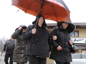Lars Hagberg/THE CANADIAN PRESS
Ontario teacher Jaclyn McLaren (left) arrives at the Quinte Courthouse in Belleville on Tuesday.