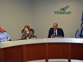 Council introduced a minimum age of nine for the Community Clean Up Program at its Feb. 27 meeting. Left to right: director of community safety Jay Granley and councillors Darlene Chartrand, Eris Moncur and Bill McAree (Jeremy Appel | Whitecourt Star).