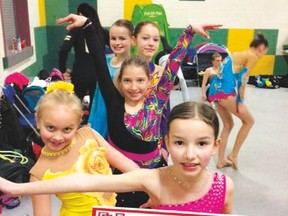 Brazeau gymnasts line up for the start of the invitational meet
