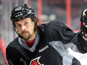 Erik Karlsson looks down the bench as the Ottawa Senators practice at Canadian Tire Centre on Feb. 9, 2017. (Wayne Cuddington/ Postmedia)