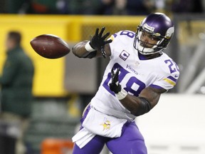In this Jan. 3, 2016 file photo, Minnesota Vikings' Adrian Peterson warms up before an NFL football game against the Green Bay Packers in Green Bay, Wis. (AP Photo/Matt Ludtke, File)