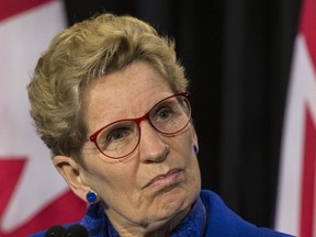 Premier Kathleen Wynne answers questions at Queen's Park in Toronto, Ont. on Monday March 6, 2017. (Craig Robertson/Toronto Sun)