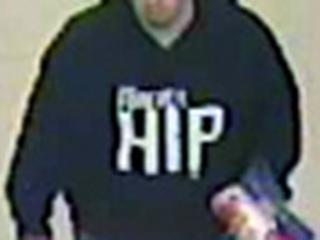 Suspect of a wallet theft captured on a grocery store's surveillance in Kingston, Ont. on Wednesday February 15, 2017. Photo supplied by Kingston Police
