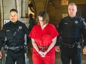 Laurel Schlemmer, who is accused of drowning two of her sons, is escorted to the courtroom at the Allegheny County Courthouse Wednesday, March 8, 2017. (Andrew Rush/Pittsburgh Post-Gazette via AP)