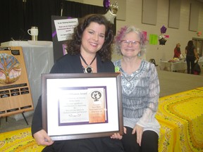 Shelley Green, left, with event organizer Phyl McCrum is the winner of the International Women's Day ApreSHEation Award. (HEATHER RIVERS/WOODSTOCK SENTINEL-REVIEW)