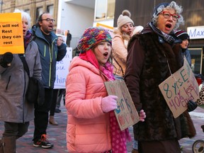 Tim Miller/The Intelligencer
Lindy Powell, alongside seven-year-old niece Anna Baldwin-Powell, take part in the International Women’s Day march on Wednesday in Belleville.