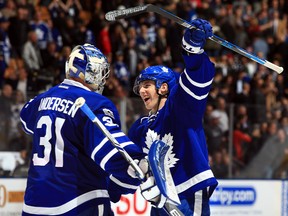 Maple Leafs goaltender Frederik Andersen is congratulated by teammate Mitch Marner following Toronto's 3-2 win over the Detroit Red Wings at Air Canada Centre on March 7, 2017. (VAUGHN RIDLEY/Getty Images)