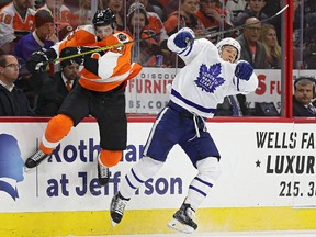 Brandon Manning of the Philadelphia Flyers checks Nikita Soshnikov of the Toronto Maple Leafs during an NHL game on Jan. 26, 2017. (Patrick Smith/Getty Images)