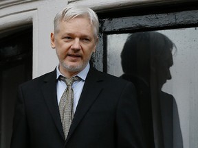 In this Feb. 5, 2016 file photo, WikiLeaks founder Julian Assange speaks from the balcony of the Ecuadorean Embassy in London. (AP Photo/Kirsty Wigglesworth, File)