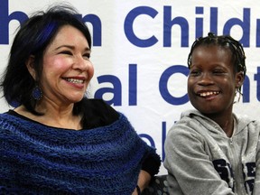 Elissa Montanti, left, of the Global Medical Relief Fund, smiles with Janet Sylva during a press conference at Cohen Children’s Medical Center in New Hyde Park, N.Y., on Thursday, March 9, 2017. (AP Photo/Frank Eltman)