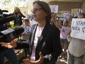 Anita Krajnc was charged for giving water to dehydrated pigs—who were being taken to slaughter on a sweltering day in June 2015at a Burlington slaughterhouse —and faces up to six months in jail and a $5,000 fine." (Jack Boland/Toronto Sun/Postmedia Network)