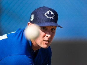 Toronto Blue Jays starting pitcher Aaron Sanchez throws a bullpen session during spring training in Dunedin on Feb. 17, 2017. (THE CANADIAN PRESS/Nathan Denette)