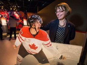Historian and curator Jennifer Anderson with a cutout of Sidney Crosby celebrating the Olympic Gold Medal game win in overtimeas the exhibition called Hockey at the Canadian Museum of History prepares to open this weekend and media was invited in for a sneak peek. Trace the sport's evolution through historic highlight reels, one-of-a-kind artifacts and interactive components. WAYNE CUDDINGTON / POSTMEDIA