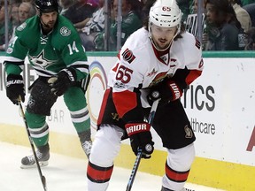Erik Karlsson of the Ottawa Senators skates the puck against the Dallas Stars during an NHL game at the American Airlines Center on March 8, 2017. (Ronald Martinez/Getty Images)