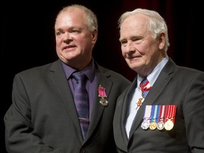 Barry Gatemen of Elmwood was honoured by Gov. Gen. David Johnston in a ceremony Thursday at the London Convention Centre. Gateman and James Sylvest rescued a woman from a burning vehicle. (MIKE HENSEN, The London Free Press)