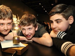 Carl A. Nesbitt Public School students Simon Gionet, 11, left, William Romas, 11, and Nicholas Vitiello explore the 101 Inventions That Changed the World exhibition at Science North in Sudbury, Ont. on Thursday March 9, 2017. "101 Inventions That Changed the World is a journey, travelling through time and locations, exploring various inventions," said Jennifer Pink, Science North's science director. "This special exhibition allows visitors to explore how some things that we use every day were created, invoking curiosity and sparking an interest in inventing and innovating." John Lappa/Sudbury Star/Postmedia Network