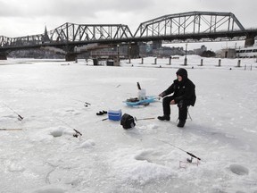Michel Ratte was out for a fish on the Ottawa River in Gatineau Thursday March 9, 2017. Michel had five rods going hoping to land a big walleye.
