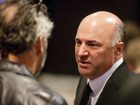 Federal Conservative leadership candidate Kevin O'Leary (R) chats with former Dragon's Den co-star Brett Wilson before speaking at an Alberta Prosperity Fund luncheon at the Metropolitan Conference Centre in Calgary, Alta., on Thursday, March 9, 2017. The Conservative Party of Canada will elect its new leader on May 27. Lyle Aspinall/Postmedia Network