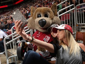 There weren’t too many fans that took in the Senators-Coyotes game, but the ones that did looked like they had a good time. (Getty Images)