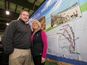 Walter Brooks and Nancy Dofflmyer of the Golf Harrison Group in Ocean City, Md., are offering golf to Canadians at close to par, trying to cut out the dollar difference. Wayne Cuddington/Postmedia Network