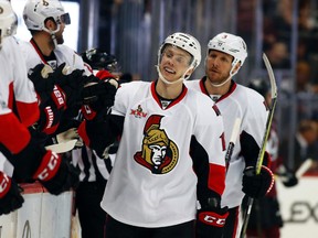 Ottawa Senators left wing Ryan Dzingel, right, is congratulated after scoring against the Colorado Avalanche in the Saturday, March 11, 2017, in Denver. (AP Photo/David Zalubowski)