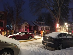 Edmonton Fire Rescue Services battle a blaze at 107 Avenue and 125 Street in a vacant bungalow on the evening of Saturday, March 11, 2017. Seven units were called out to fight the fire, which started in the home's basement.