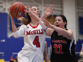 McGill's Frédérique Potvin tries to score against Carleton's Heather Lindsay in the second half of Saturday's game. Potvin finished with 16 points.