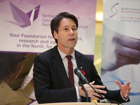 Ontario Health Minster Eric Hoskins speaks to the crowd at Health Sciences North in Sudbury, Ont. on Nov. 8, 2016. (Gino Donato/Sudbury Star/Postmedia Network)