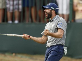 Adam Hadwin reacts after sinking the final putt to win the Valspar Championship at Innisbrook in Palm Harbor, Fla., on Sunday, March 12, 2017. (AP Photo/Mike Carlson)