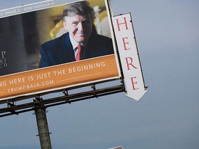 This Feb. 27, 2009 file photo shows a Trump Ocean Resort Baja highway billboard with a photo of Donald Trump that advertises condos for sale on the outskirts of Tijuana, Mexico. (AP Photo/Guillermo Arias, File)