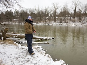 Cameron Baille, 15 of Byron was out trying his luck in the Thames River near the Kilworth bridge west of London, Ont. Baille and and a friend weren't having a lot of success in the high cold water on Sunday March 12, 2017. (MIKE HENSEN, The London Free Press)