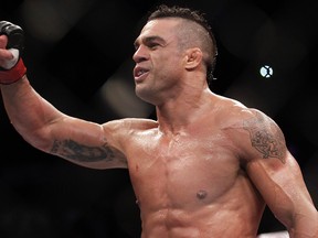 Vitor Belfort's departure from the UFC will leave a massive hole on its roster. (Andre Penner/AP Photo/Files)