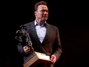 Arnold Schwarzenegger holds the Arnold Classic trophy onstage at the Greater Columbus Convention Center during the Arnold Sports Festival 2017 on March 4, 2017 in Columbus, Ohio. (Photo by Maddie Meyer/Getty Images)