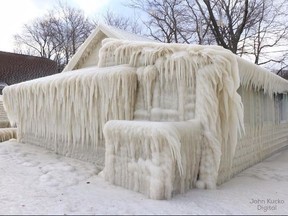 A home in Webster, N.Y. has been encased in ice thanks to the harsh wind and waves from Lake Ontario. (John Kucko/Instagram)