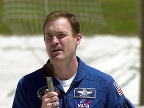 In this Thursday, April 6, 2000 file photo, Atlantis mission commander James Halsell Jr. speaks to reporters at the Kennedy Space Center in Cape Canaveral, Fla. (AP Photo/Peter Cosgrove, File)