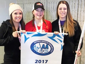 Mitchell's Jamison Beuermann (middle) poses with assistant coaches Shawnee Ryan (left) and Melissa Ryan, also Mitchell natives, with their championship banner, their gold medals and the golden stick signifying their 2017 U14AA ringette title in Nepean this past weekend. SUBMITTED
