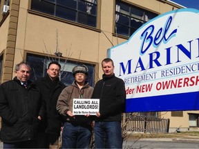 Submitted photo
Belleville city councillor Garnet Thompson stands outside the Bel Marine building with Quinte Region Landlords Association members Robert Gentile (president), Steve Xu and Todd Theissen.
