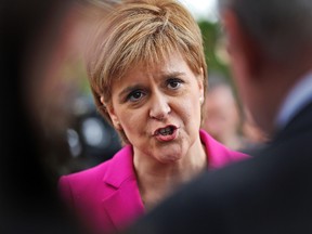 In this Monday, May 23, 2016 file photo, Scottish First Minister Nicola Sturgeon talks to journalists after meeting in London. (AP Photo/Frank Augstein, File)
