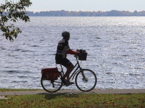 A cyclist takes advantage of the unseasonally warm weather in Breakwater Park along King St. West in Kingston on Wednesday October 19 2016. Ian MacAlpine /The Whig-Standard