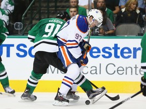 Connor McDavid of the Edmonton Oilers skates against Tyler Seguin of the Dallas Stars at American Airlines Center on October 13, 2015 in Dallas. (Getty Images)