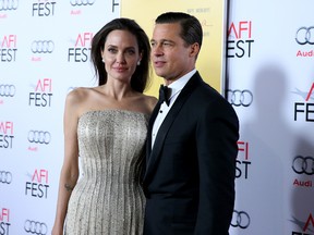 Angelina Jolie Pitt (L) and actor-producer Brad Pitt attend Audi at the opening night gala premiere of 'By the Sea' during AFI FEST 2015 presented by Audi at TCL Chinese 6 Theatres on November 5, 2015 in Hollywood, California (Photo by Jonathan Leibson/Getty Images for Audi)